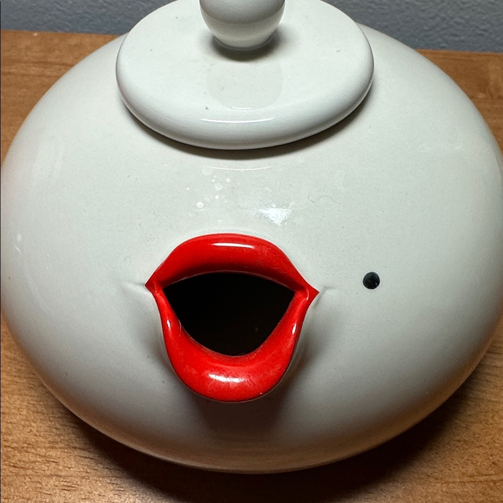 Lip Service" collection by Fitz and Floyd tea pot.